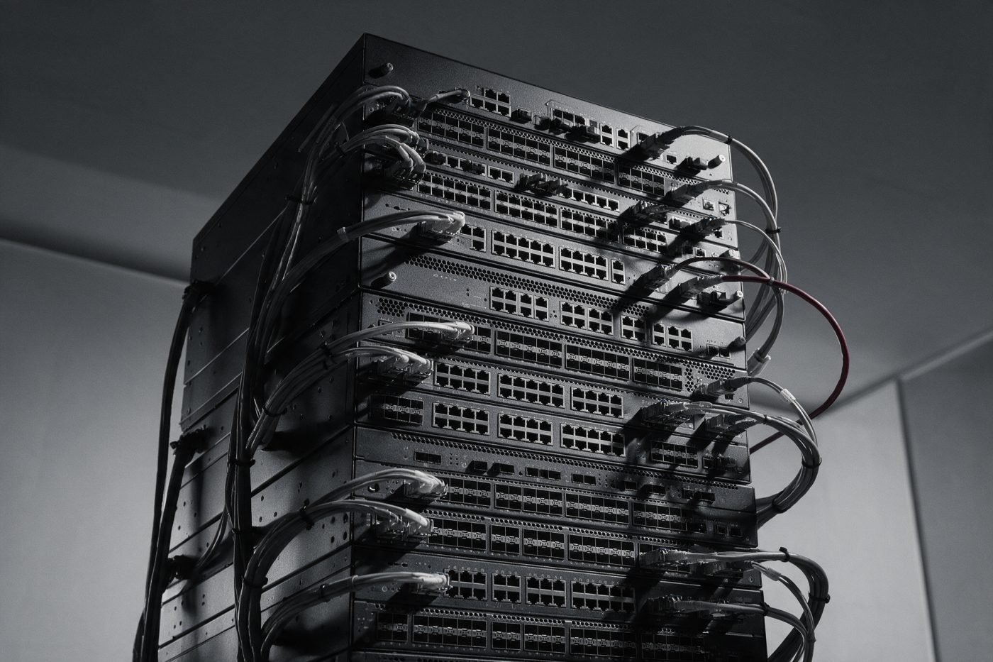 Rack-mounted firewall and network security appliance stack with dressed cabling